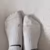 getragene Sneaker Socken