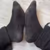 Schwarze abgenutzte Socken