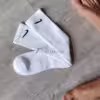 Intensiv getragene weiße Nike Socken – echter Duft, echtes Tragegefühl