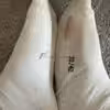 schmutzige weiße Sneaker Socke