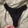 Sexy schwarzer Spitzentanga