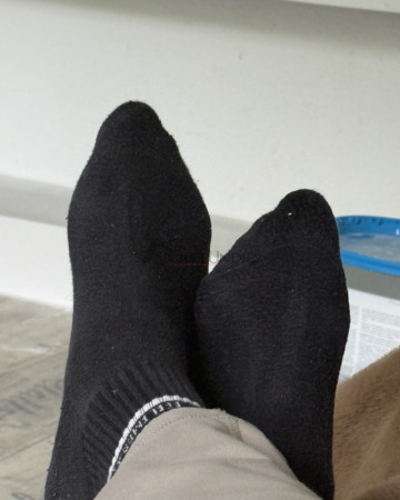 Schwarze Socken. 1 Tag lang getragen