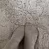 Getragene graue Socken