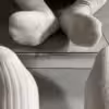 Beige getragene Socken mit Streifen