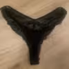schwarzer Tanga aus Spitze